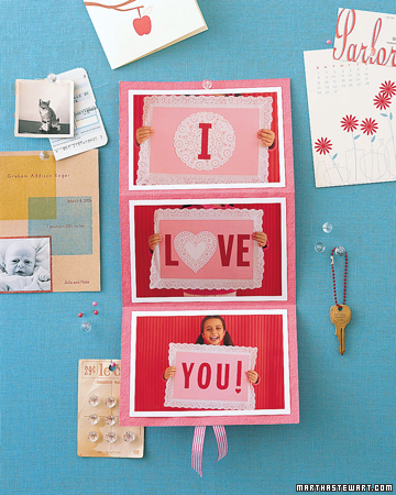 Create this card by making signs out of construction paper, doilies, and adhesive letters from an office-supply store. Photograph your child holding the signs, then tape the pictures to construction paper and fold the card accordion-style.