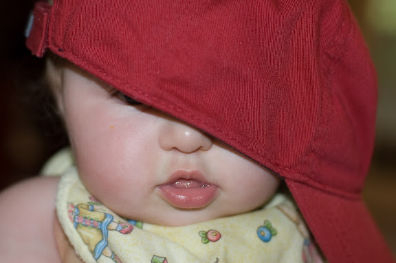 Sandra had fun putting Sam in her hat...
