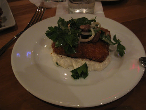 Here's a fried hunk of head cheese.  That's a love it or hate it dish, and I loved it.
