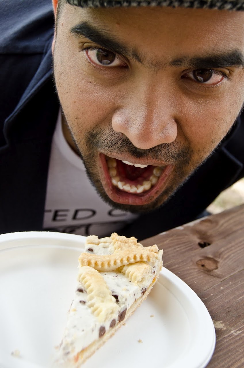 Kash at Budget Traveller eating crostata di ricotta di pecora
