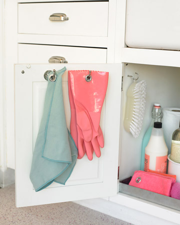 Keep your cleaning supplies below the sink and away from the food! These door hooks are perfect to help organize your kitchen's cleaning cabinet. Keep your cleaning supplies below the sink and away from the food! These door hooks are perfect to help organize your kitchen's cleaning cabinet.