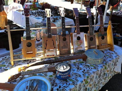 The instruments are made from cigar and coffee boxes.