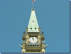 6096 Ottawa -Parliament Buildings - Centre Block - Peace Tower clock and two of the four grotesques at the corners of the Peace Tower