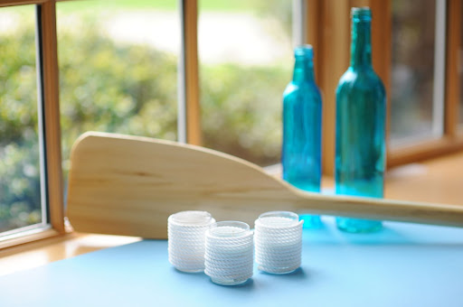Whether scattered around a cocktail area, or placed along a reception table, these votive candles will add a warm, nautical touch to your celebration.
