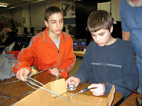 The Controls Team learning how to solder
