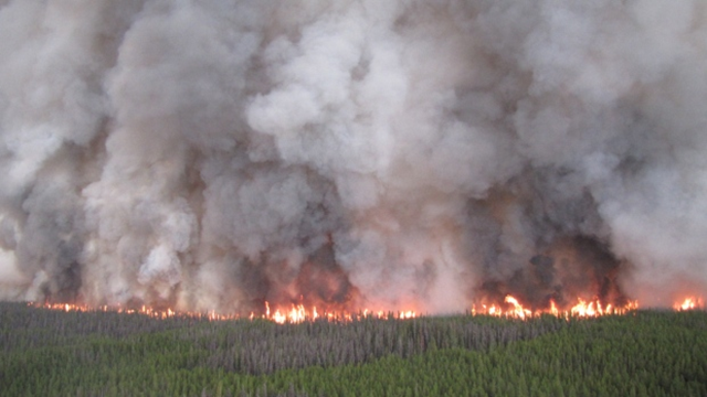 The largest fire of the 2014 in Canada occurred near the Chelaslie River near Burns Lake, consuming 1,330 square kilometres. On 30 September 2014, it was still burning, but 75 per cent contained. Photo: WMB / CBC News