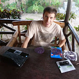Important traveling tools: laptop, mobile phone, mosquito coils