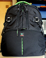 The Kata DR-467i holds the camera along with acessories in the bottom compartment, other gear and miscellaneous things in the top compartment and a 15“+ laptop in the rear laptop compartment
