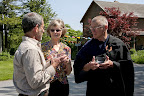 gathered group before walk, andy stern, eryl and wayman with bowls.jpg
