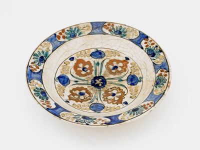 Plate | Origin:  Iran | Period: 17th century  Safavid period | Details:  Not Available | Type: Stone-paste painted under glaze | Size: W: 8.3  cm | Museum Code: S1997.59 | Photograph and description taken from Freer and the Sackler (Smithsonian) Museums.