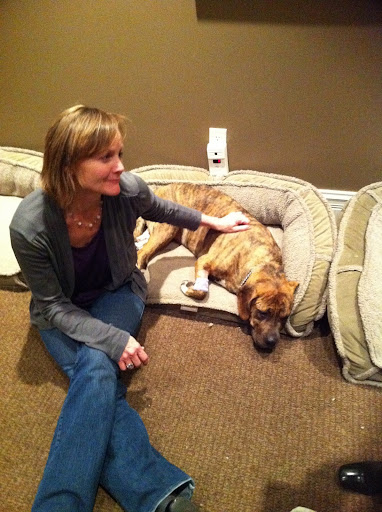 Purina executive Brenda Bax gets emotional upon meeting the dog she'd help search for the previous night.