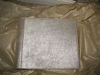 This soft, shimmery book is from Cursive, which is located in ABC Carpet & Home. It has nice touches of silver AND gold.