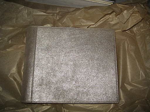 This soft, shimmery book is from Cursive, which is located in ABC Carpet & Home. It has nice touches of silver AND gold.