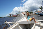Riding a boat to recife da fora, a reef, in porto seguro.