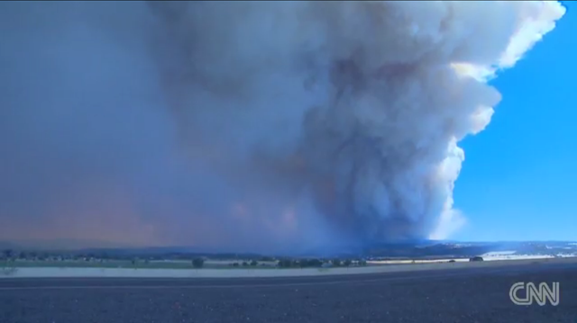 Smoke bilows from the record-breaking forest fire near Eager, Arizona, on 9 June 2011. CNN