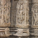 The right two image are depicting Shiva in similar postures, shown with four hands carrying trishula and snake in upper two hands. One lower hand carries kamandalu and another lower hand is in varada pose. Nandi is shown seated near the feet.