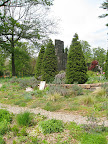 The ruin garden is made mysterious by stone tablets strewn here and there.