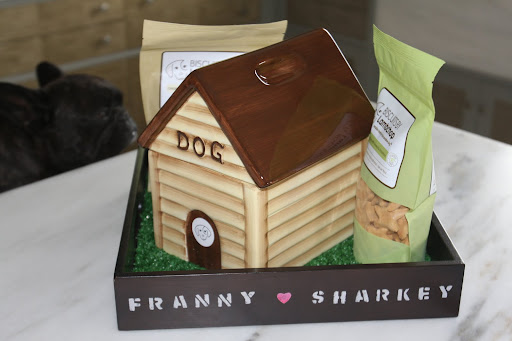 Well isn't that the cutest!  There's even a biscuit jar in the shape of a dog house.