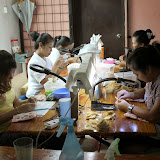Photo 12: Local female workers processing edible bird’s nests in a factory in Kuching.