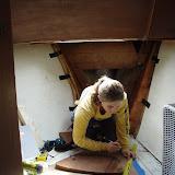 Erin making a mock up of the anchor well bulkhead before we cut it,