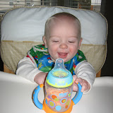 Trying the sippy cup 11-21-11 (1).JPG
