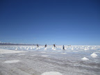 Standing on the stacks of salt - the salt miners scrape the salt into these piles to drain excess water.