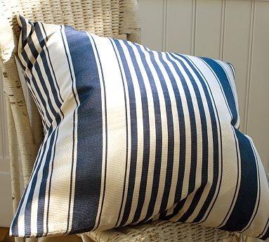 The stripes on this pillow make it look great, and the outdoor material makes it durable. (crateandbarrel.com) The stripes on this pillow make it look great, and the outdoor material makes it durable. (crateandbarrel.com)