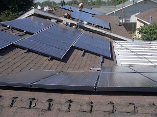 This roof was a tough one to layout, many obstacles to work around including different roof elevations.  Care must be taken when grouping the panels,  panels facing different directions should not be connected together ie. east or west or south facing. Once the strings are taken to the D/C combiner there is no issue.