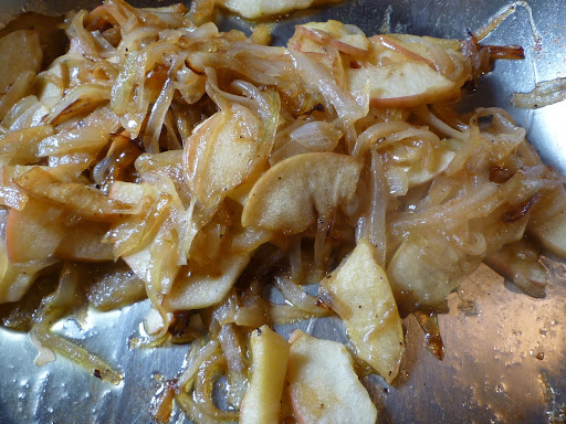 Cook the onion and apple until tender.