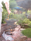 A fire pit was built just for this bubbling pot of mole.