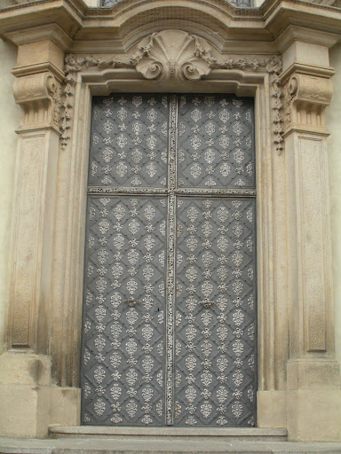 The detailing makes this door look almost armor-like. (Prague)