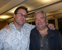 Tsunami over the years / Tory Enerson (Tsunami) and Ron Buzil (Vayu).  Fleet party 2009.