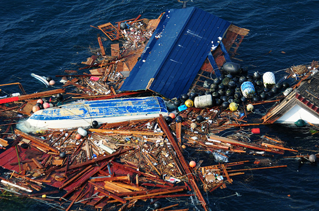 Japanese tsunami debris on the open ocean, March 2011. Corbis