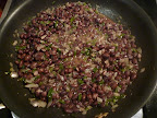 Add the beans to the sofrito along with a little water and simmer away.