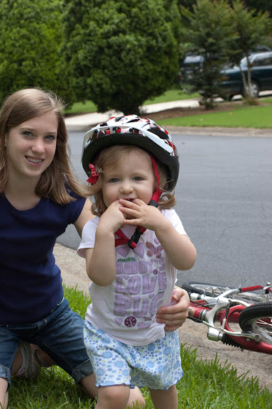 She just wouldn't rest until she had Laura Grace's helmet on.