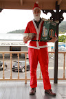 Santa heading off for work bearing gifts in a beer box!  Ha!