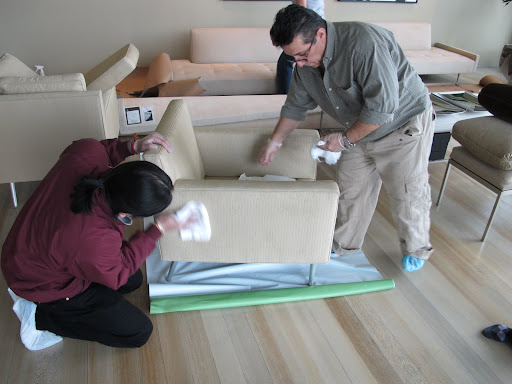 After the initial drying, they hand blot any last damp areas.
