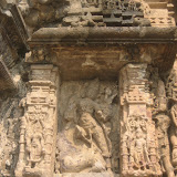 Mahishasurmardini, Durga slaying demon Mahishasura. Though the image is much damaged as of now, however the buffalo demon can be identified without any difficulty. Goddess' spear is shown piercing through the demon's body.