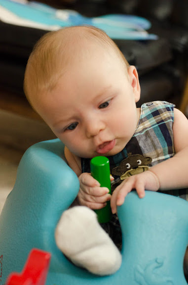 Nate eating her toys.