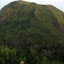 looking back at the smaller summit, with a larger temple on the slopes.