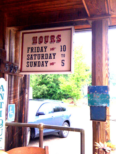 This is a sign hanging outside of an antiques store in upstate New York. I think the Old West typography could easily lend itself to a BBQ wedding's signage.