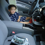 The CD player with the change it, and the little boy who put it there