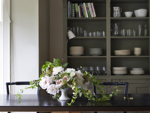 Look how beautifully these trailing honeysuckle vines spill out of the arrangement on to the table.