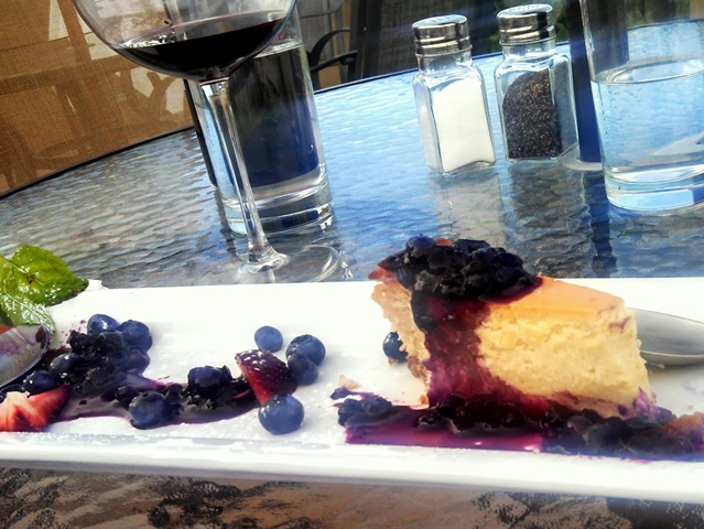 White chocolate cheesecake with fresh berry compote for dessert
