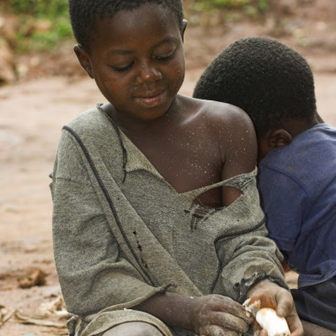 Kampala region / Miriam Nambi. Old widow, looking after 6 grandchildren, whose parents died with HIV AIDS