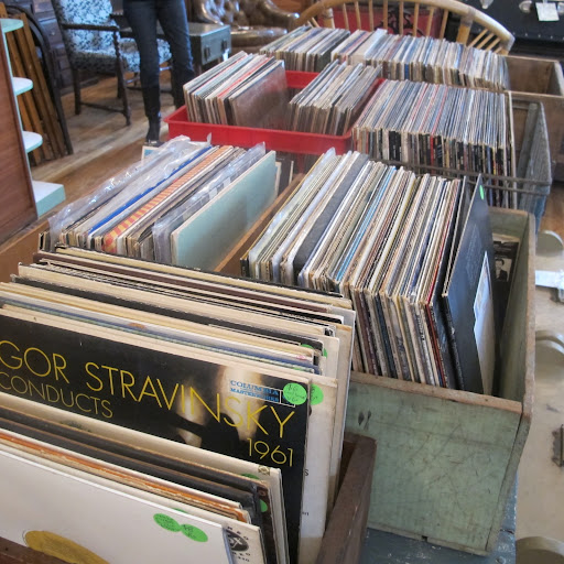 Bins and bins of records give life to the furnishings; pieces this unique deserve vintage turntable tunes.
