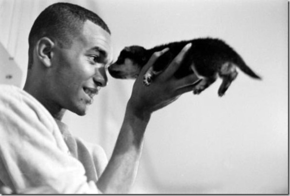 A young man and his dog. Photograph by Paul Schutzer. Montgomery, Alabama, USA, 1961.