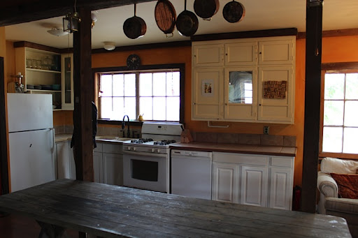 Love the hanging copper pots! Love the hanging copper pots!