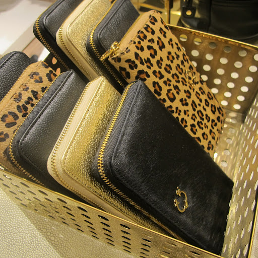 Clutches covered in fur and leather.