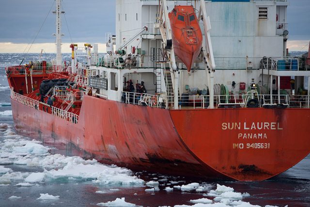 The South Korean-owned, Panamanian registered Sun Laurel, a vessel that has already spilt oil into the sea below 60 degrees and inside the Australian Antarctic Territorial waters attempts to refuel the whalers' factory ship, the Nisshin Maru, with heavy fuel oil (HFO), 19 February 2013. This is a violation of the Antarctic Treaty and a violation of Australian law and a violation of International law (MARPOL). Photo: Sea Shepherd Conservation Society